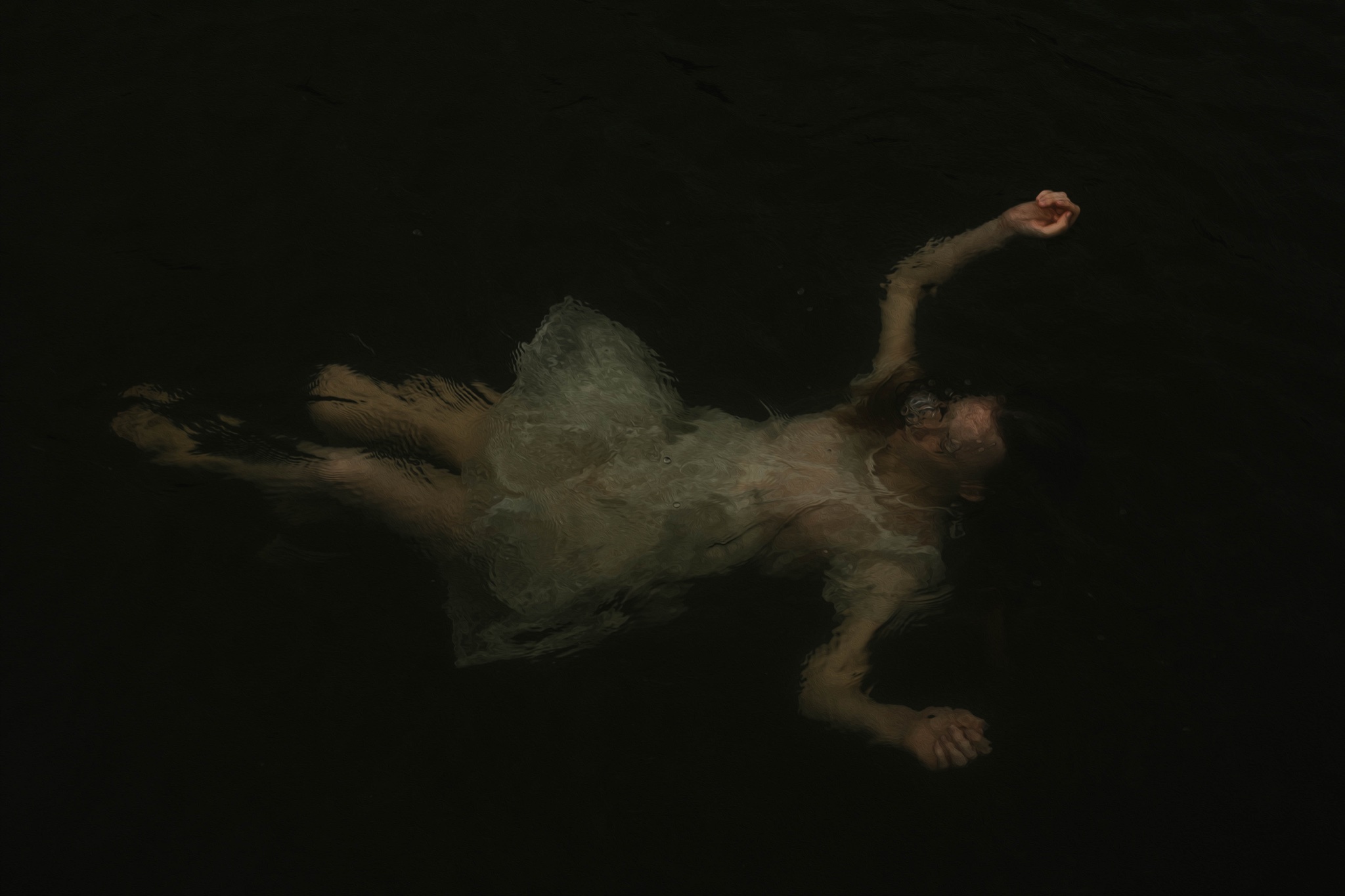 Fine art portrait photography in dark water by Lafayette Louisiana visual artist Mallory Stanford